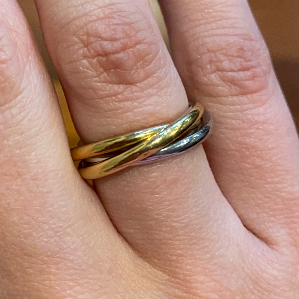 Trinity three-band interlocking ring in silver, yellow gold, and rose gold color